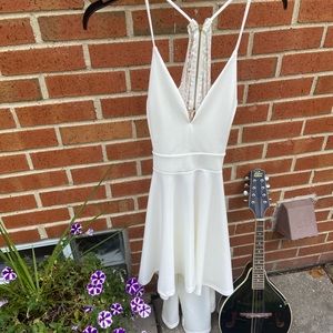 Beautiful and flattering flowy white Windsor dress